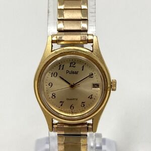 Vtg Pulsar Watch Women 20mm Gold Tone Date v247-0350 Stretch New Battery 7.25"
